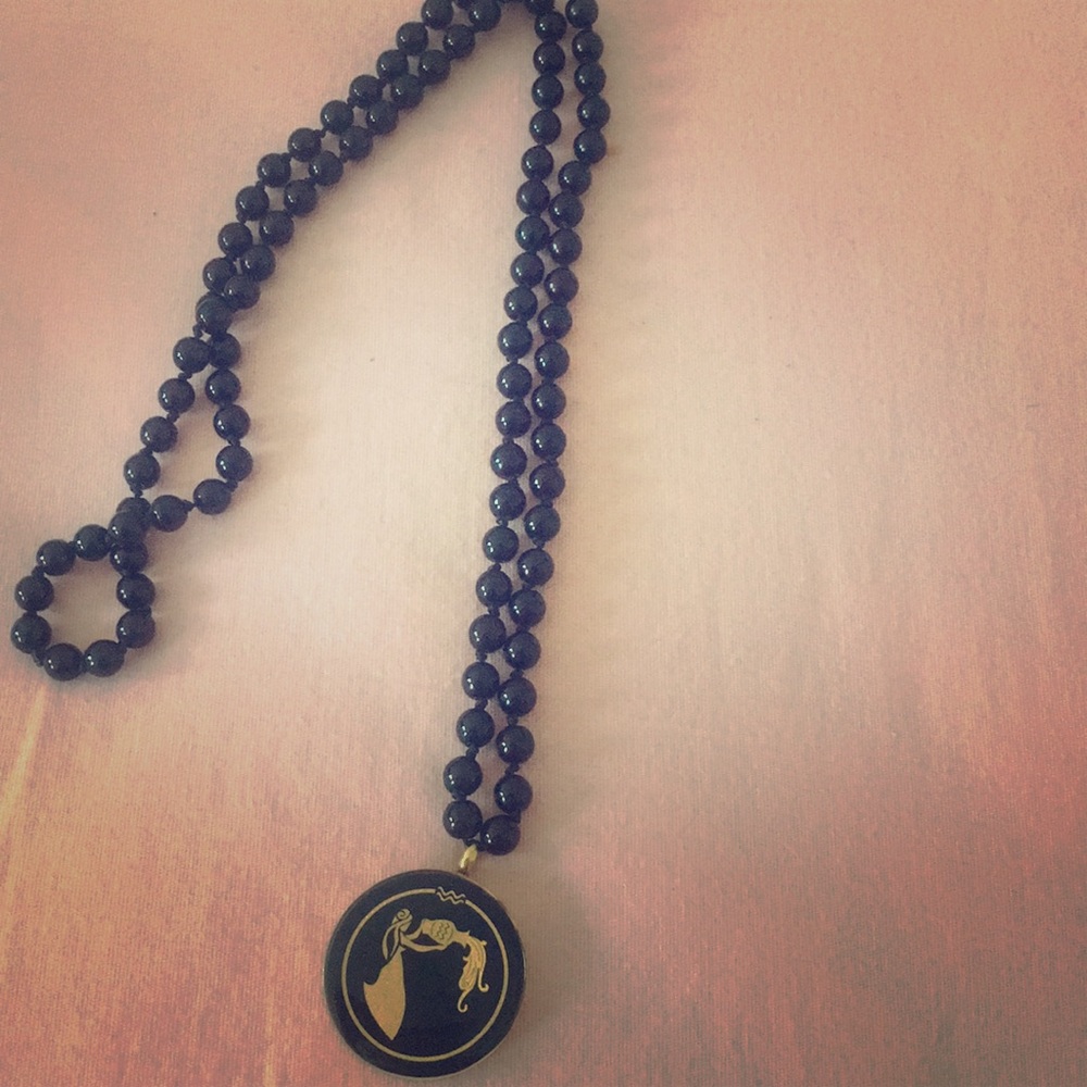Aquarius symbol necklace